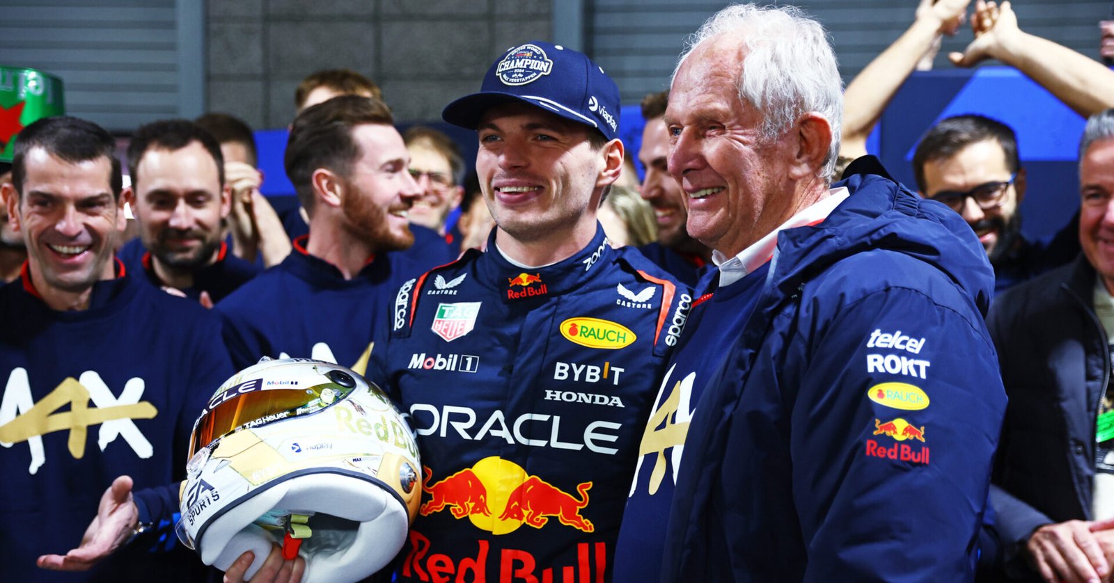 LAS VEGAS, NEVADA - NOVEMBER 23: 2024 F1 World Drivers Champion Max Verstappen of the Netherlands and Oracle Red Bull Racing celebrates with Oracle Red Bull Racing Team Consultant Dr Helmut Marko in the Paddock after the F1 Grand Prix of Las Vegas at Las Vegas Strip Circuit on November 23, 2024 in Las Vegas, Nevada. (Photo by Mark Thompson/Getty Images)