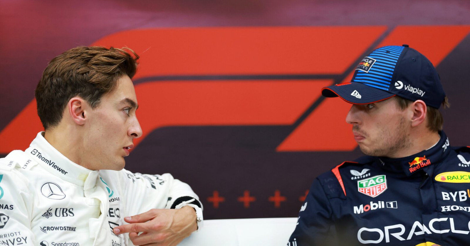 LUSAIL CITY, QATAR - NOVEMBER 30: Pole position qualifier Max Verstappen of the Netherlands and Oracle Red Bull Racing and Second placed qualifier George Russell of Great Britain and Mercedes attend the press conference after qualifying ahead of the F1 Grand Prix of Qatar at Lusail International Circuit on November 30, 2024 in Lusail City, Qatar. (Photo by Bryn Lennon/Getty Images) // Getty Images / Red Bull Content Pool // SI202411300418 // Usage for editorial use only //