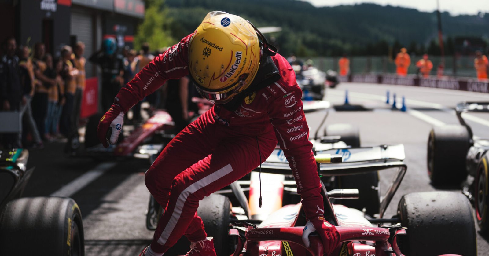 Lewis Hamilton climbing out of his SF-25 at the Belgian GP