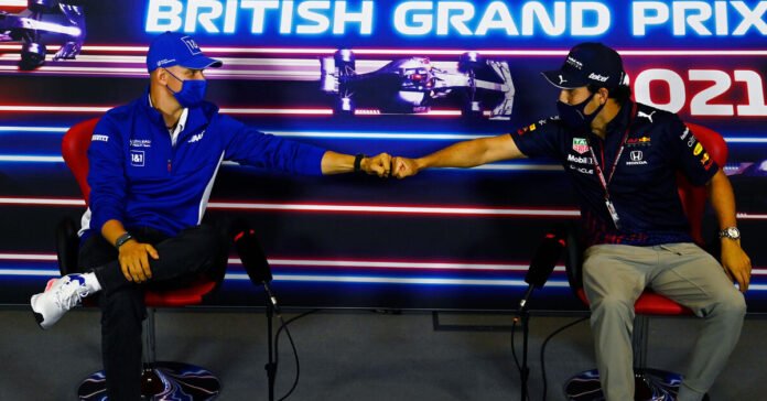 Mick Schumacher and Sergio Perez in an interview // Photo by Mark Sutton, Getty Images / Red Bull Content Pool //