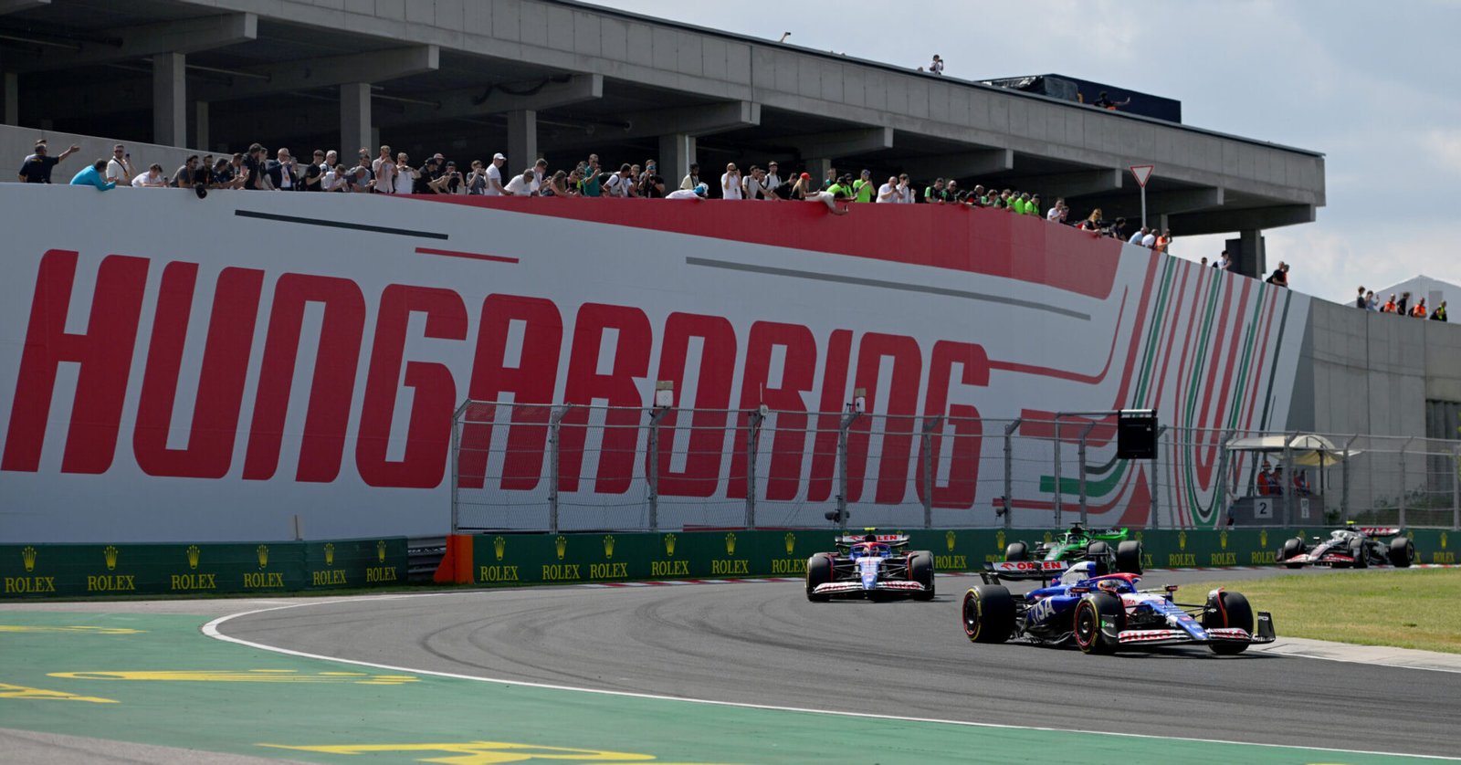 BUDAPEST, HUNGARY - JULY 21: Daniel Ricciardo of Australia driving the (3) Visa Cash App RB VCARB 01 leads Yuki Tsunoda of Japan driving the (22) Visa Cash App RB VCARB 01 during the F1 Grand Prix of Hungary at Hungaroring on July 21, 2024 in Budapest, Hungary. (Photo by Rudy Carezzevoli/Getty Images) // Getty Images / Red Bull Content Pool // SI202407210412 // Usage for editorial use only //