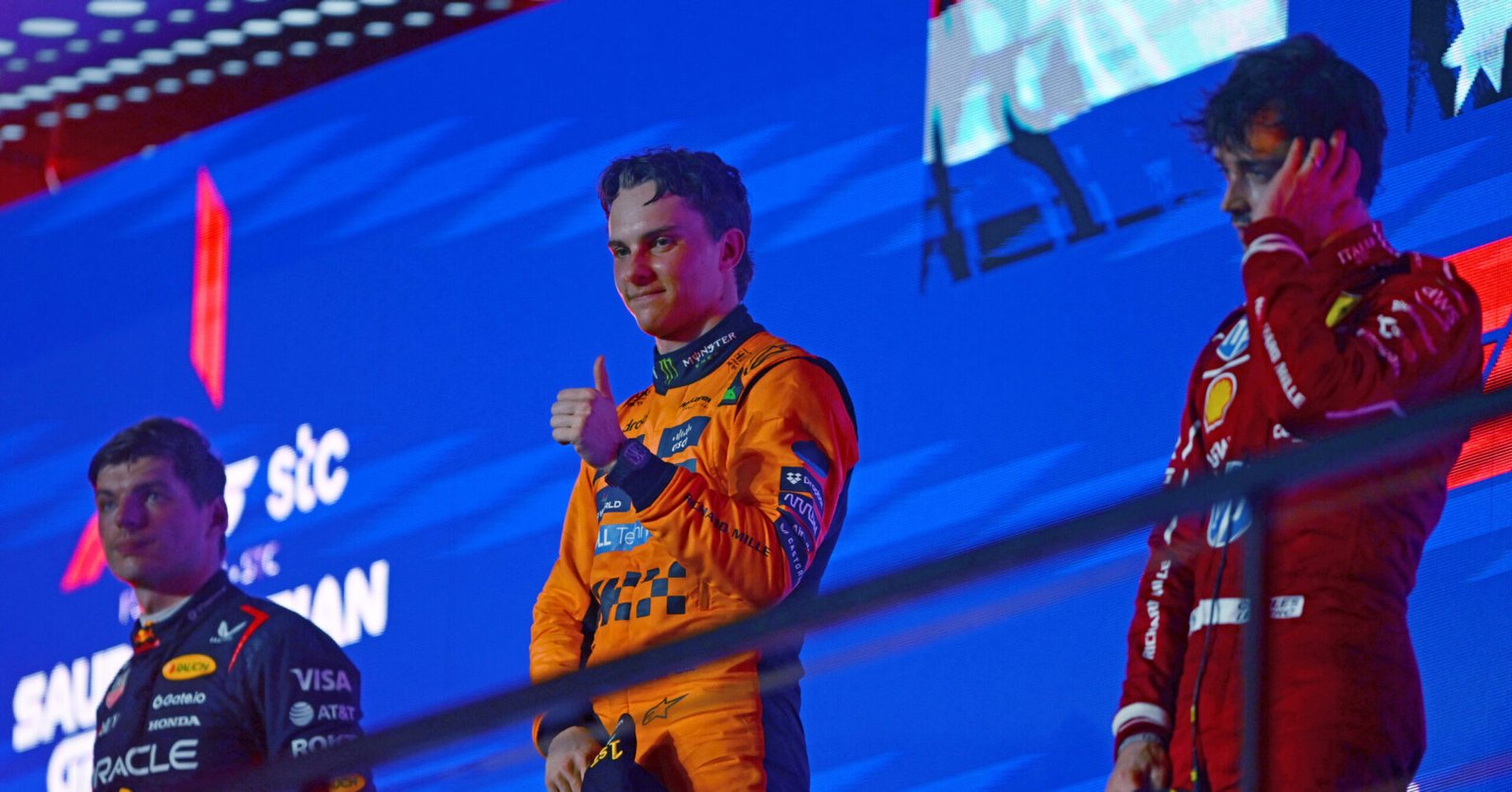 JEDDAH, SAUDI ARABIA - APRIL 20: Race winner Oscar Piastri of Australia and McLaren Second placed Max Verstappen of the Netherlands and Oracle Red Bull Racing and Third placed Charles Leclerc of Monaco and Scuderia Ferrari on the podium during the F1 Grand Prix of Saudi Arabia at Jeddah Corniche Circuit on April 20, 2025 in Jeddah, Saudi Arabia. (Photo by Rudy Carezzevoli/Getty Images) // Getty Images / Red Bull Content Pool // SI202504200319 // Usage for editorial use only //