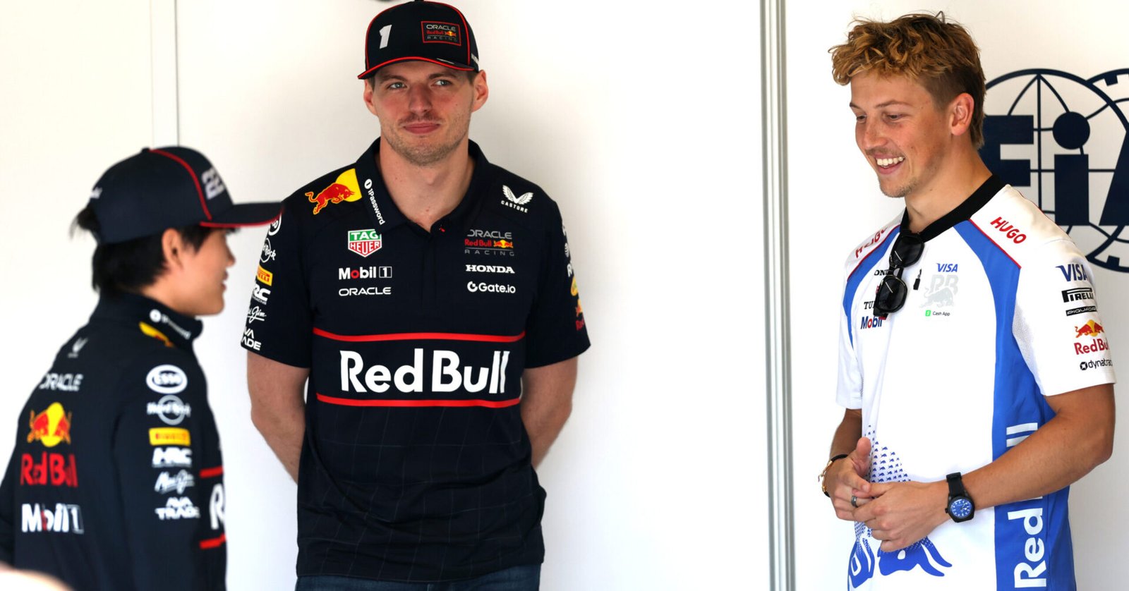 IMOLA, ITALY - MAY 18: Yuki Tsunoda of Japan and Oracle Red Bull Racing with Max Verstappen of the Netherlands and Oracle Red Bull Racing and Liam Lawson of New Zealand and Visa Cash App Racing Bulls prior to the F1 Grand Prix of Emilia-Romagna at Autodromo Internazionale Enzo e Dino Ferrari on May 18, 2025 in Imola, Italy. (Photo by Ryan Pierse/Getty Images) // Getty Images / Red Bull Content Pool // SI202505180134 // Usage for editorial use only //