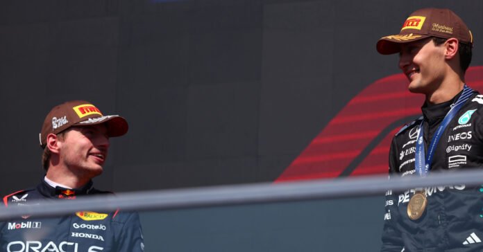 MONTREAL, QUEBEC - JUNE 15: Second placed Max Verstappen of the Netherlands and Oracle Red Bull Racing and Race winner George Russell of Great Britain and Mercedes AMG Petronas F1 Team on the podium during the F1 Grand Prix of Canada at Circuit Gilles-Villeneuve on June 15, 2025 in Montreal, Quebec. (Photo by Andy Hone/LAT Images) // Getty Images / Red Bull Content Pool // SI202506150807 // Usage for editorial use only //