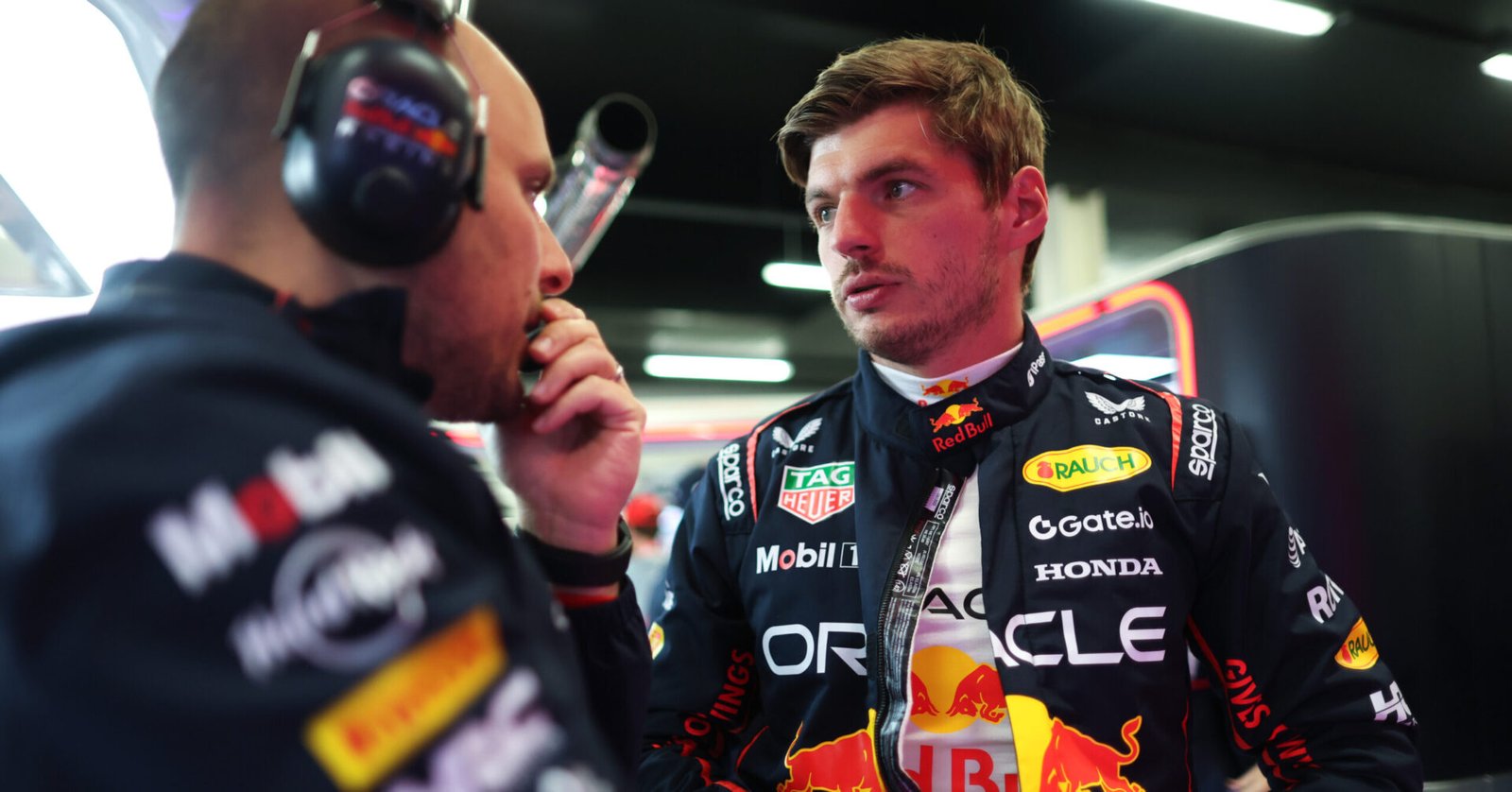 NORTHAMPTON, ENGLAND - JULY 05: Max Verstappen of the Netherlands and Oracle Red Bull Racing talks with Gianpiero Lambiase, Head of Racing of Oracle Red Bull Racing in the garage during qualifying ahead of the F1 Grand Prix of Great Britain at Silverstone Circuit on July 05, 2025 in Northampton, England. (Photo by Mark Thompson/Getty Images) // Getty Images / Red Bull Content Pool // SI202507050340 // Usage for editorial use only //