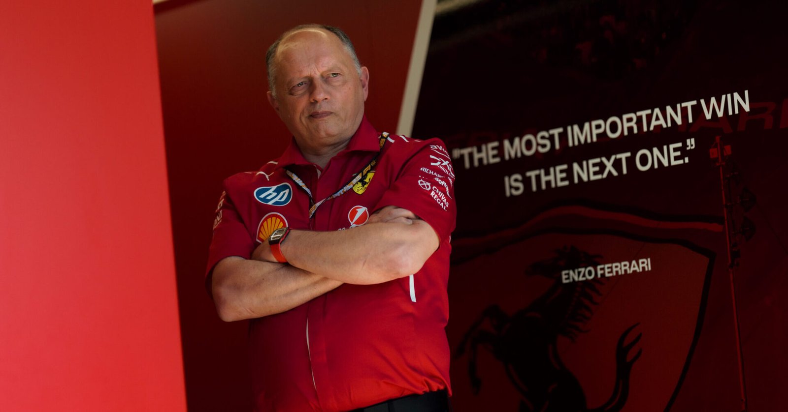 Fred Vasseur looks on in the Ferrari garage.