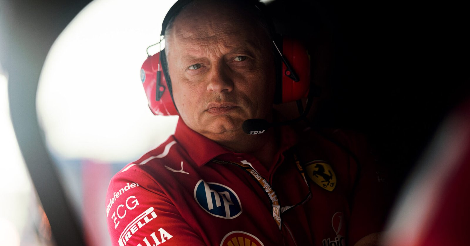 Fred Vasseur crosses his arms from the pitwall.