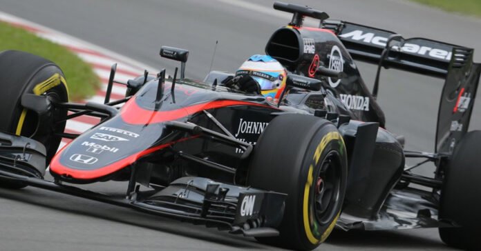 Fernando Alonso driving his 2015 Honda-powered McLaren at the Japanese Grand Prix