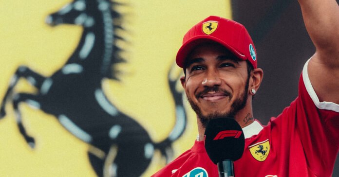 Lewis Hamilton at the Hungarian GP smiling and waving to fans