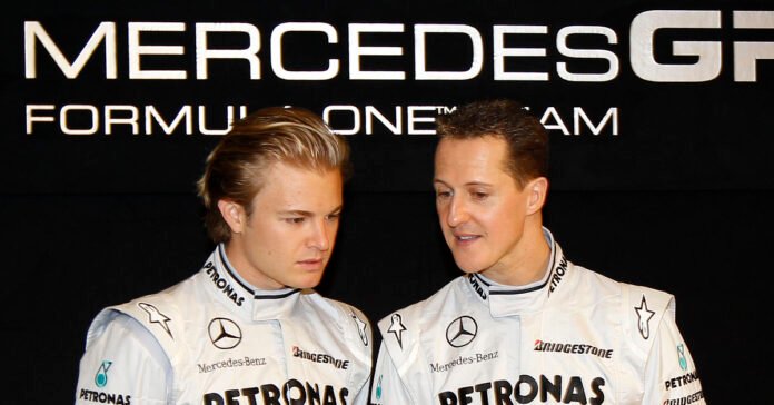 Nico Rosberg and Michael Schumacher at the launch of the first modern-day Mercedes F1 car in 2010 in Stuttgart, Germany. // Mercedes Content Pool //