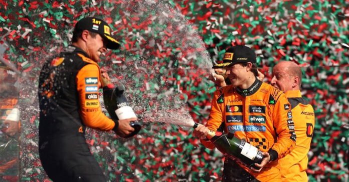 Lando Norris on the podium after McLaren's 200th race win // Photo from @McLaren F1/ X //