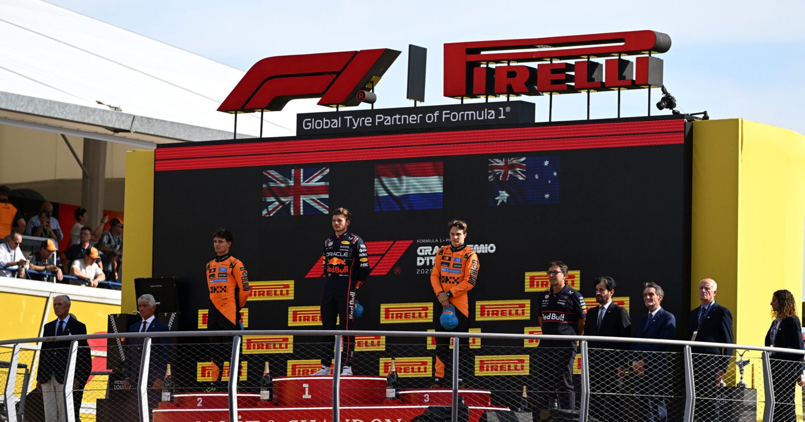 MONZA, ITALY - SEPTEMBER 07: Race winner Max Verstappen of the Netherlands and Oracle Red Bull Racing Second placed Lando Norris of Great Britain and McLaren Third placed Oscar Piastri of Australia and McLaren and Pierre Wache, Technical Director of Oracle Red Bull Racing on the podium during the F1 Grand Prix of Italy at Autodromo Nazionale Monza on September 07, 2025 in Monza, Italy. (Photo by Simon Galloway/LAT Images) // Getty Images / Red Bull Content Pool // SI202509070976 // Usage for editorial use only //